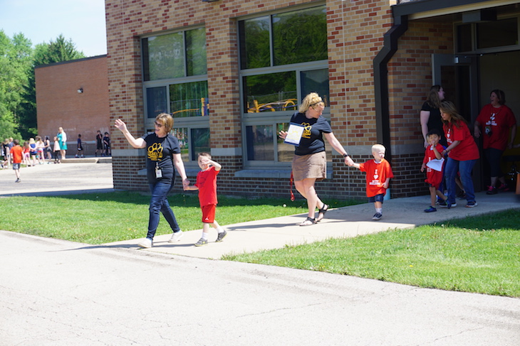 <p>Leading the first-ever Kinder Walk Parade was Early Childhood Teacher Karen Nellis! Mrs. Nellis was named 2018 Preschool Teacher of the Year by the Kane County Regional Office of Education.</p>
