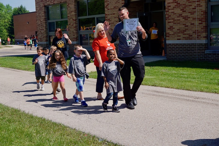 <p>Hoover-Wood School Assistant Principal Chris Milka with incoming HWS students from the Early Childhood Center.</p>
